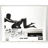 LEON WARE; a black and white promotional photograph bearing inscription and signature, 20.5 x 25cm.