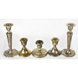 A pair of George V hallmarked candlesticks of Neo-Classical form, on octagonal bases, Walker & Hall,