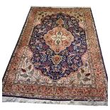 A fine handmade Kirman carpet, 293 x 194cm.