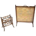 A 19th century mahogany framed fire screen inset with a needlework panel depicting Adam and Eve