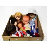 A group of six c1960s dolls, all in mostly original clothes, to include a large Walkie-Talkie doll,