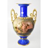 A large early 20th century Continental porcelain twin-handled vase,