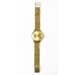 ACCURIST; a gentlemen's 9ct gold wristwatch, gilded dial set with baton numerals and date aperture,