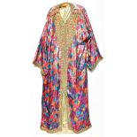 A circa 1960s silk satin effect coffee-coloured kaftan with gold trim and a panelled full-length