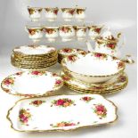 ROYAL ALBERT; a quantity of 'Old Country Roses' pattern tea and dinner ware to include a teapot,