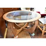 VICTOR WILKINS FOR G-PLAN; a 1960s vintage teak circular glass topped 'Astro' coffee table,