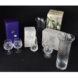 A collection of mainly boxed crystal glassware to include a Dartington Crystal vase,