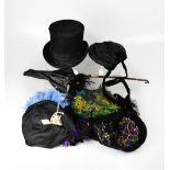 A collection of hats from various eras, dating from Victorian times to mid-20th century,