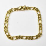 A 9ct gold figaro flat link curb bracelet, length 19cm, approx 11.5g.