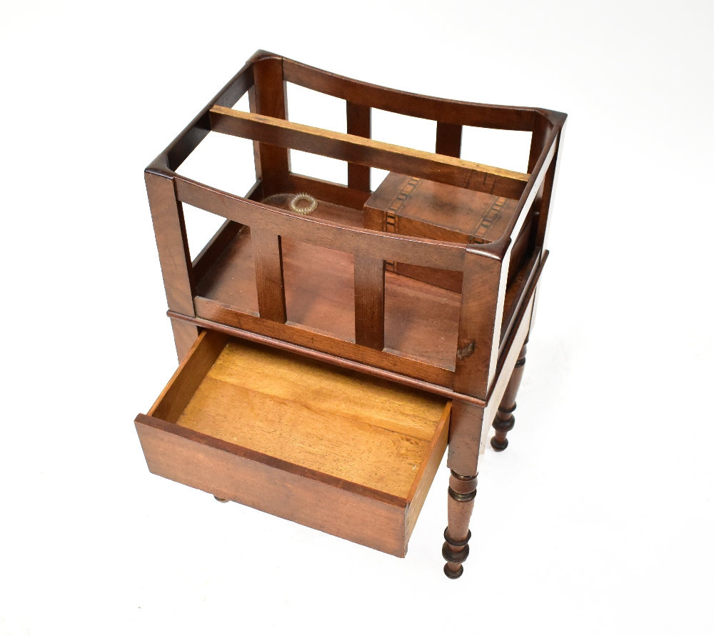 A 20th century mahogany Canterbury of simple form, with slatted sides, hidden frieze drawer,