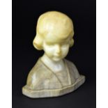 KESTIL; an alabaster bust of a young girl, with wavy hair, impressed to the back 'Kestil',