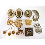 Ten various vintage costume brooches.