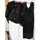 A Victorian black silk lace ribbon work and beaded evening cape,