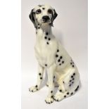 A large modern pottery ornament of a seated Dalmatian, height approx 78cm.