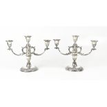 A pair of Canadian hallmarked silver three-branch squat candelabra in the Neoclassical style,