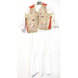 An early 20th century Turkish traditional dress, heavy cream linen panelled dress,