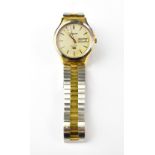 BULOVA; a gentlemen's gold tone stainless steel quartz wristwatch,