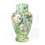 A large late 19th/early 20th century Chinese vase, with fluted shaped top,