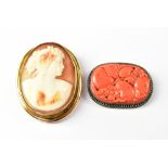 A 9ct gold set cameo brooch and a Chinese silver mounted coral brooch (2).