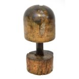 A vintage wooden wig stand mounted on a naturalistic-style wooden base, probably a marriage,