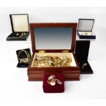 A quantity of costume jewellery to include necklaces, earrings, boxed gold plated set, dress rings,