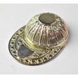 An Elizabeth II hallmarked silver caddy spoon in the form of a jockey's cap,