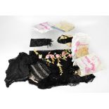 A quantity of vintage textiles to include Victorian lace with rose ribbon work, silk net beadwork,