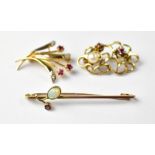 A collection of vintage gold brooches to include a 9ct gold bar brooch with a bezel set white oval