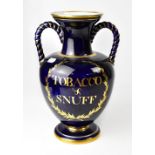 A 19th century porcelain twin-handled tobacco and snuff jar with gilt title 'Tobacco and Snuff'