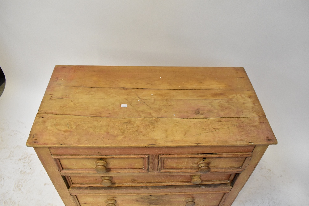 An early 20th century stripped pine chest of two short over two long graduated drawers, - Image 2 of 2