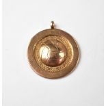 FOOTBALL INTEREST; a vintage 9ct gold football prize fob,