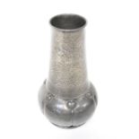 LIBERTY & CO; a Tudric pewter vase of tapering chimney form and rolled rim,