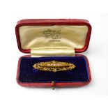 A Victorian 15ct gold lozenge-shaped brooch,