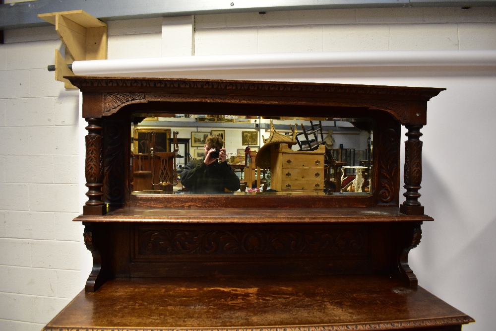 A Victorian carved oak mirror back sideboard, the carved shaped pediment with scrolls and feathers, - Image 2 of 5