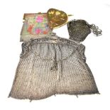 Three vintage chainmail bags, the largest with a silver plated mount and chain, height approx 18cm,