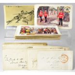 A collection of mostly military-themed antique postcards, many from WWII, to include 'The Buffs,