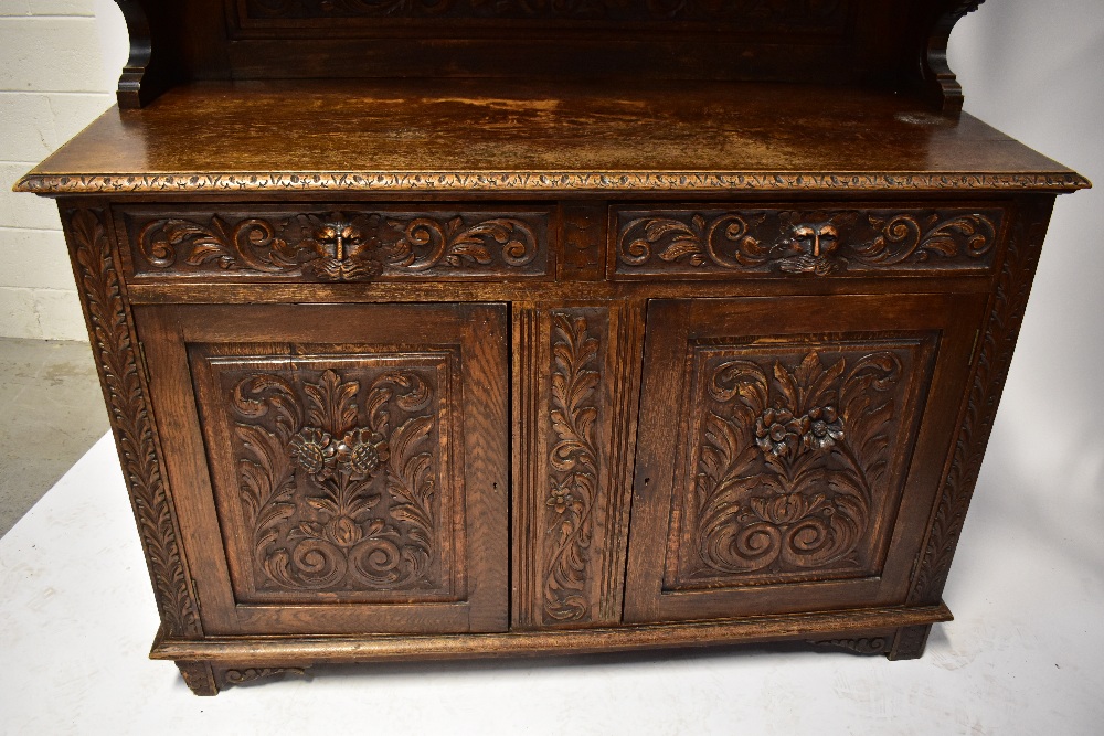 A Victorian carved oak mirror back sideboard, the carved shaped pediment with scrolls and feathers, - Image 3 of 5