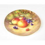 ROYAL WORCESTER; a cabinet plate hand painted with still life of apples, grapes and a raspberry,