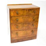 A 1940s walnut veneered bow-fronted chest of four drawers, raised on simple bracket feet,