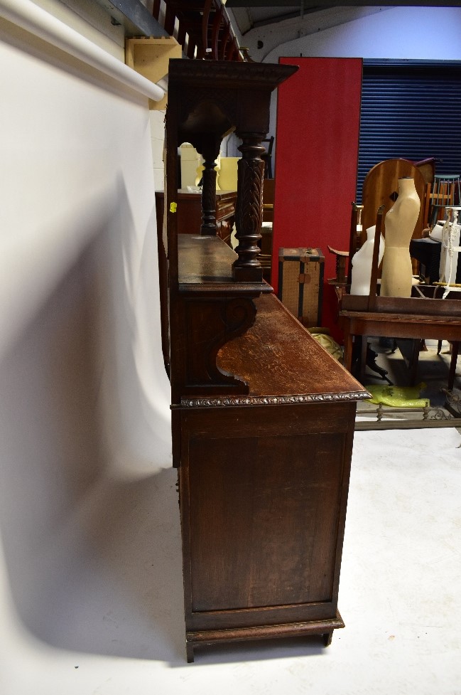 A Victorian carved oak mirror back sideboard, the carved shaped pediment with scrolls and feathers, - Image 5 of 5