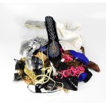 A group of textile miscellanea to include vintage hats, beadwork and beadwork trims, beaded collars,