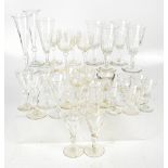 A good collection of 19th century and later clear drinking glasses, to include various ale flutes,