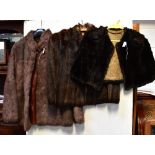 Three vintage fur items comprising a black cape with Chinese-style lining,