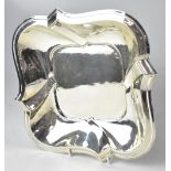 A German hallmarked silver Art Deco shaped dish of square form with rounded corners and stylised