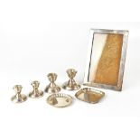 A small collection of hallmarked silverware to include a square pin dish,