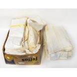 A large quantity of vintage linen to include bed linen, damask table cloths, napkins,