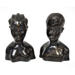 A pair of carved busts of a young man and woman from Benin, Nigeria, height of each 19cm (2).