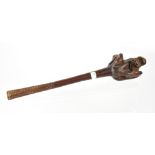 A Polynesian wooden ula with gnarled wooden top and handle, length 47cm.