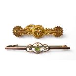 Two antique gold bar brooches comprising a 9ct gold bar brooch with bezel set peridot flanked by a