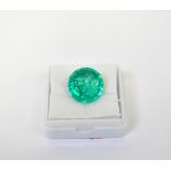 A loose 8.12 carat round emerald with GIL Laboratory Certificate.
